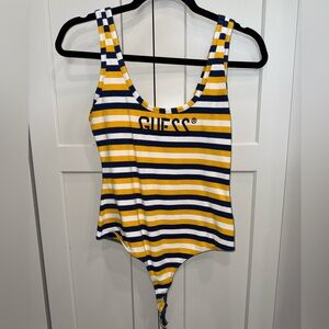 Woman’s guess body suit